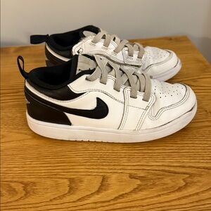 Nike Kids Air Jordan low alt shoe. Black and White. Size 1.5Y